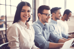 Office workers using wired headsets