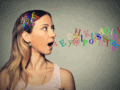 Lady facing to the right with her mouth open with various colours of letters coming out of her mouth. Used to demonstrate the use of phonetics in communication