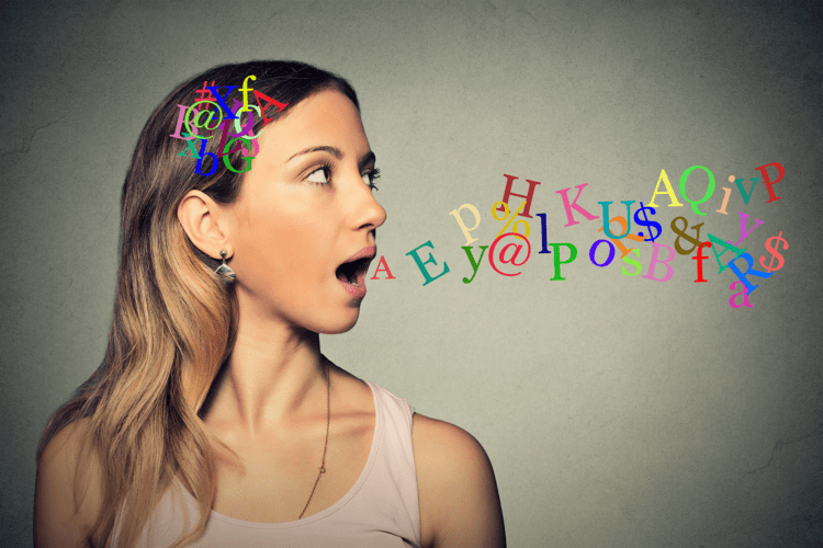 Lady facing to the right with her mouth open with various colours of letters coming out of her mouth. Used to demonstrate the use of phonetics in communication